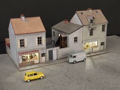 Alignement 3 maisons : 2 commerces