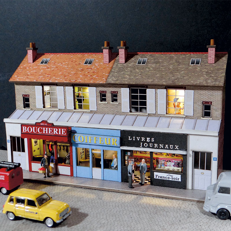 Façades avec vitrines Boucherie + Coiffeur + Journaux