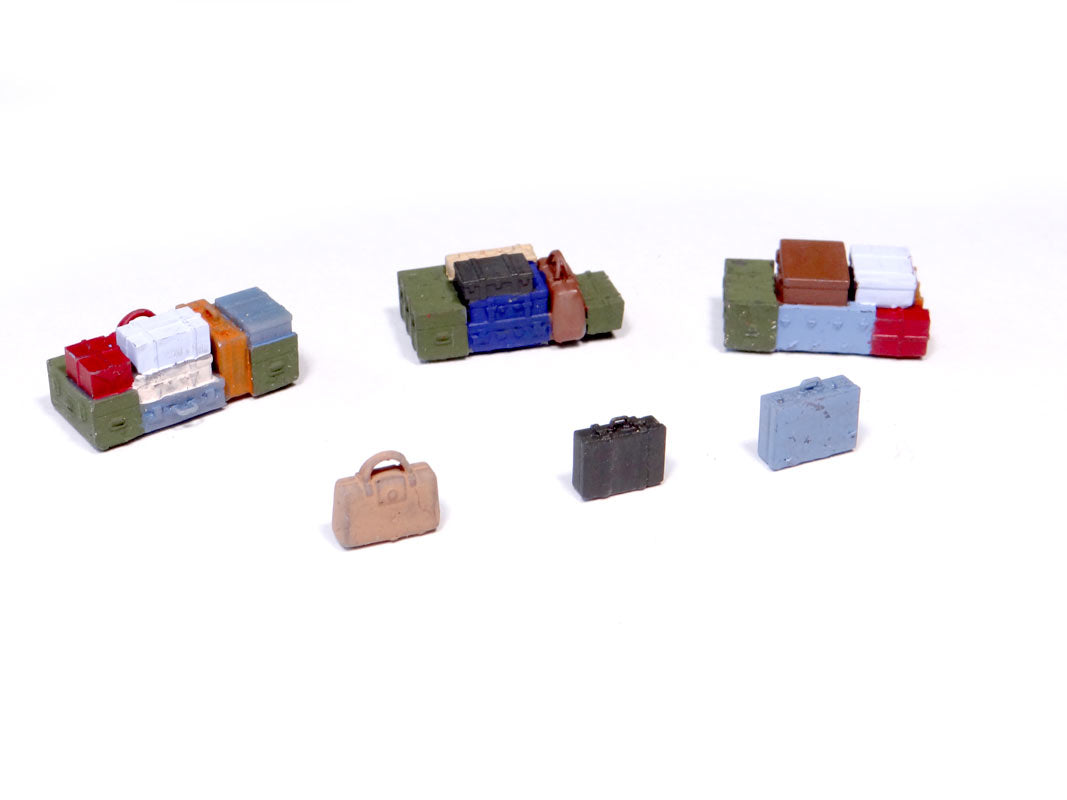 3 différents tas de bagages + 3 bagages isolés