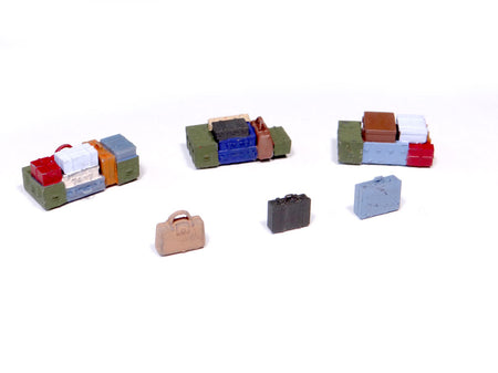 3 différents tas de bagages + 3 bagages isolés