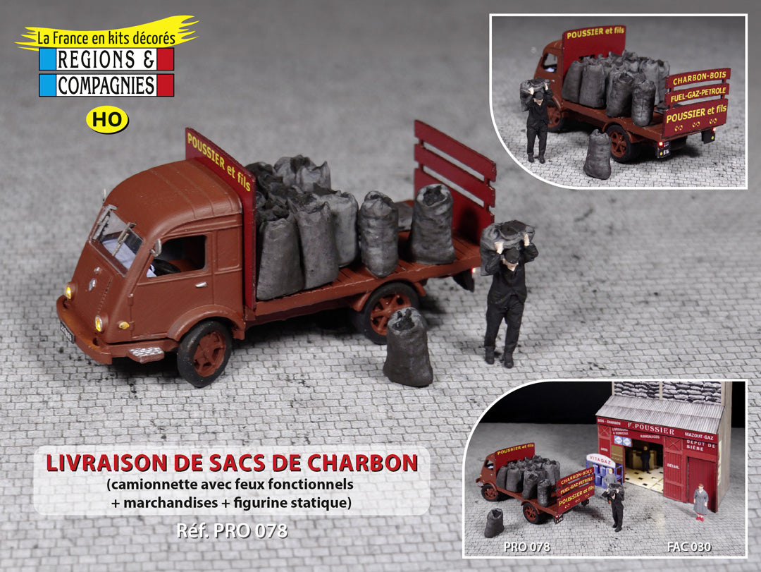 Livraison de sacs de charbon avec camion Renault Galion