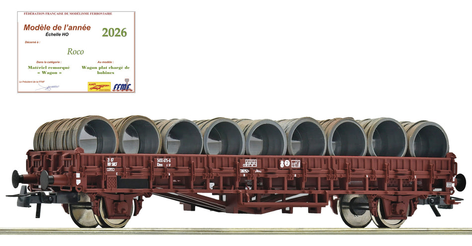 Wagon plat type Klms chargé de bobines de fil métallique, ép. IV, SNCF, DC