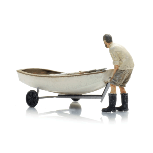 Voilier Optimist sur sa mise à l'eau + personnage-2
