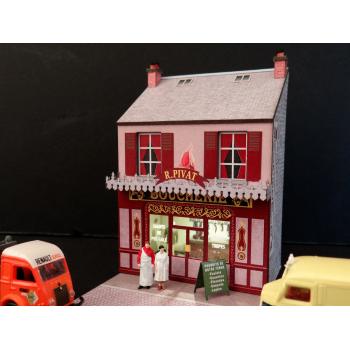 Mini-façade de boucherie avec ses figurines couple de bouchers