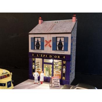 Mini-façade de commerce de boulangerie avec ses figurines couple de boulangers
