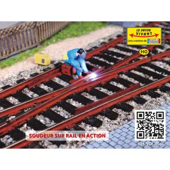 Soudeur sur rail en action
